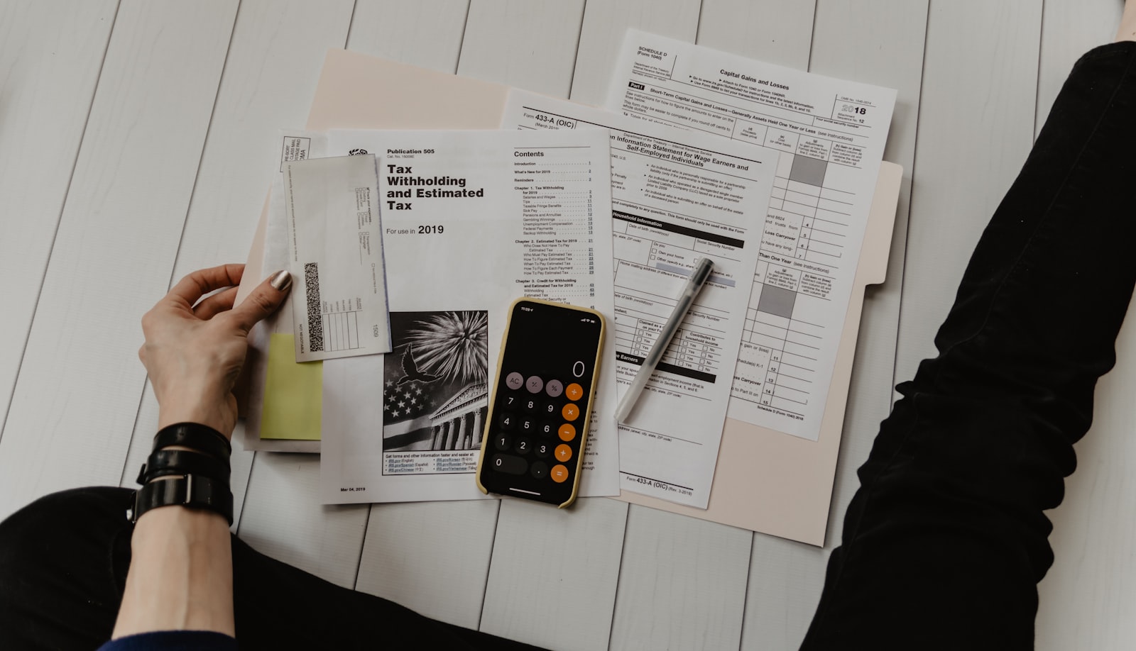 Person reviewing a health document at a desk