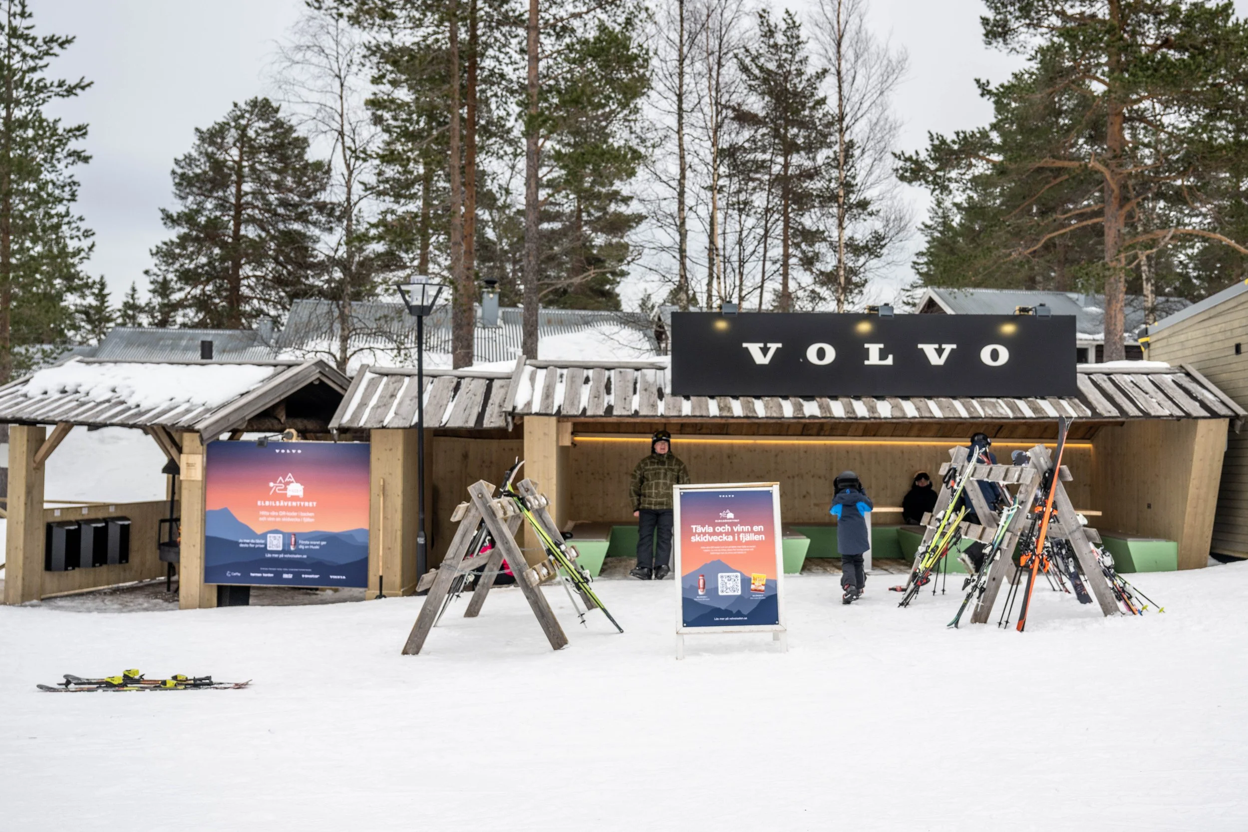 The stage set up with a couch, chairs and decorations