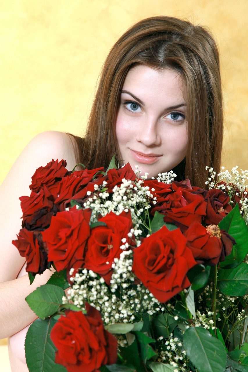 kids lying on a glass land and smiling