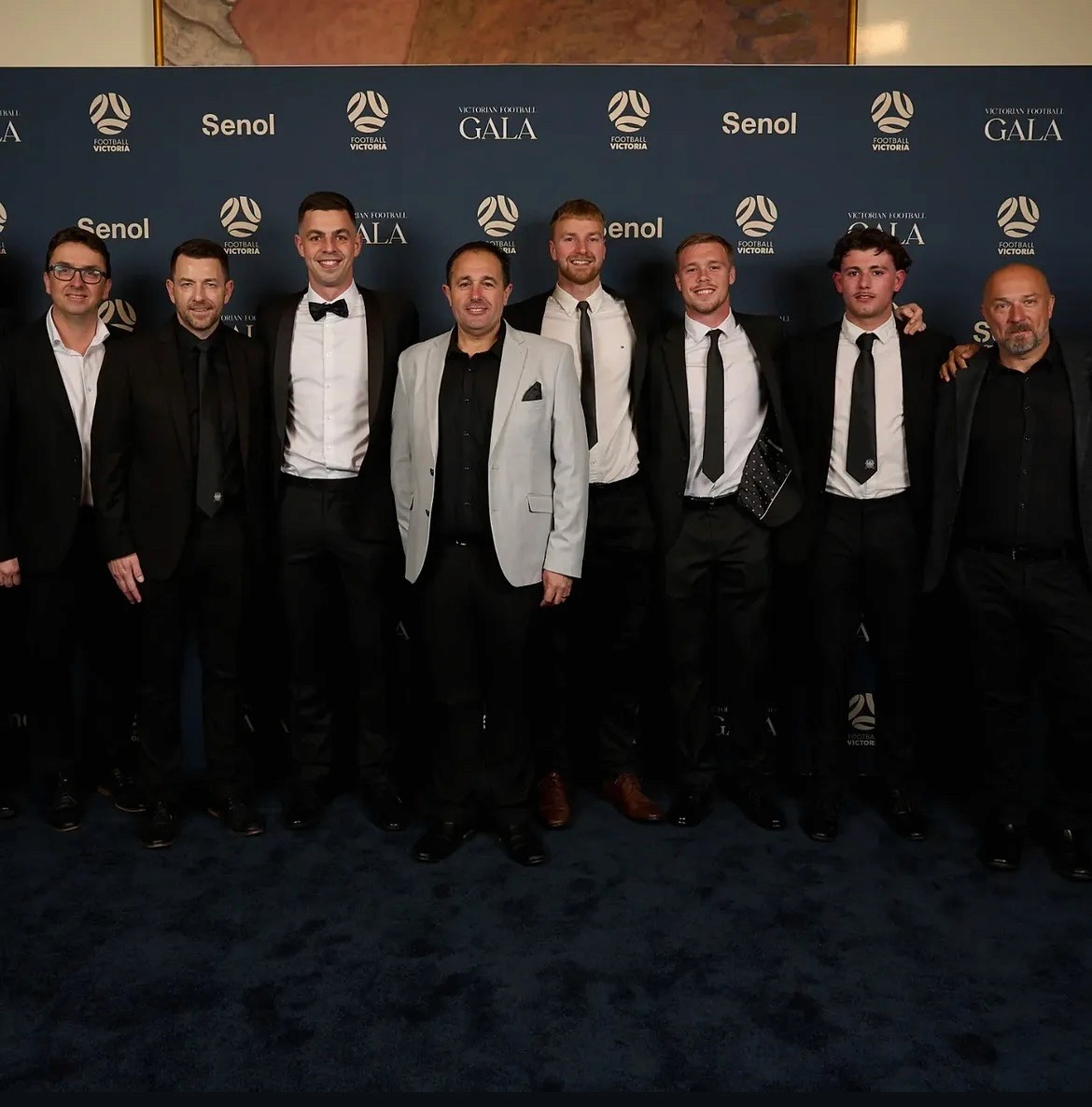North Geelong Warriors players and staff standing together at the Football Victoria VPL2 Awards Night.
