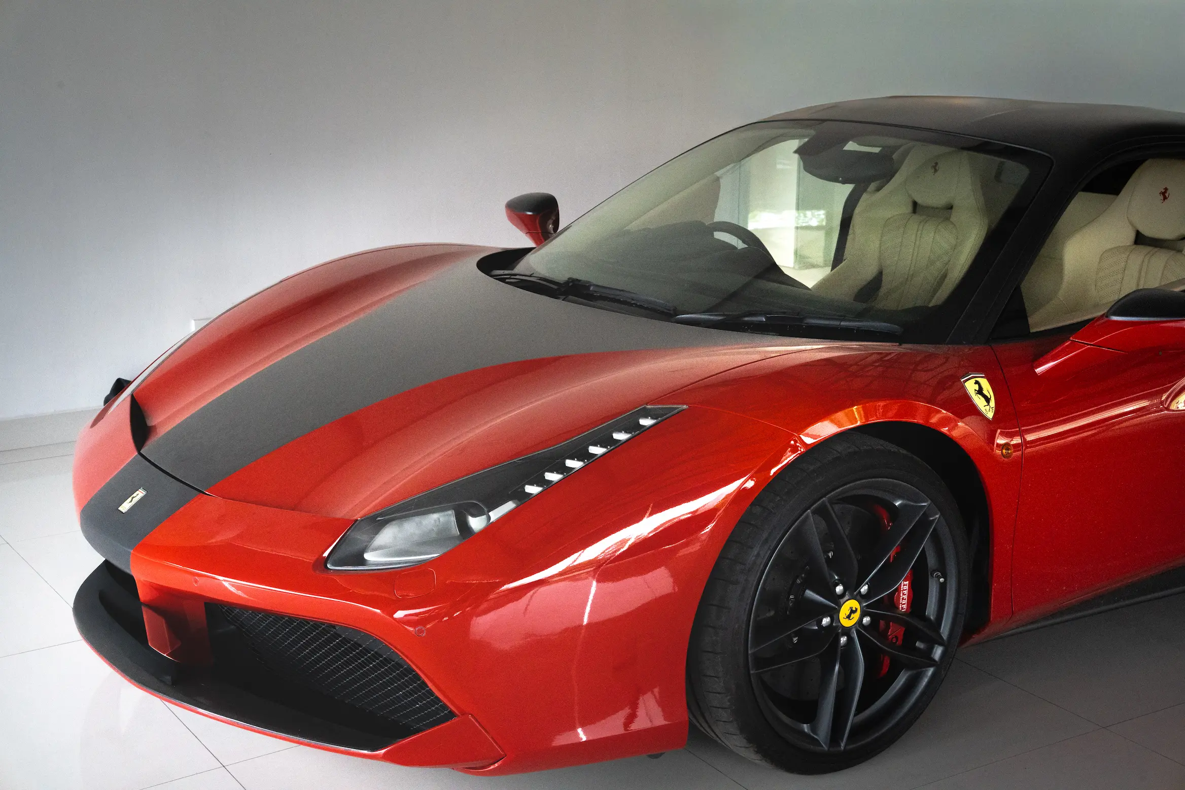 Car parked at Ideal Premier showroom area