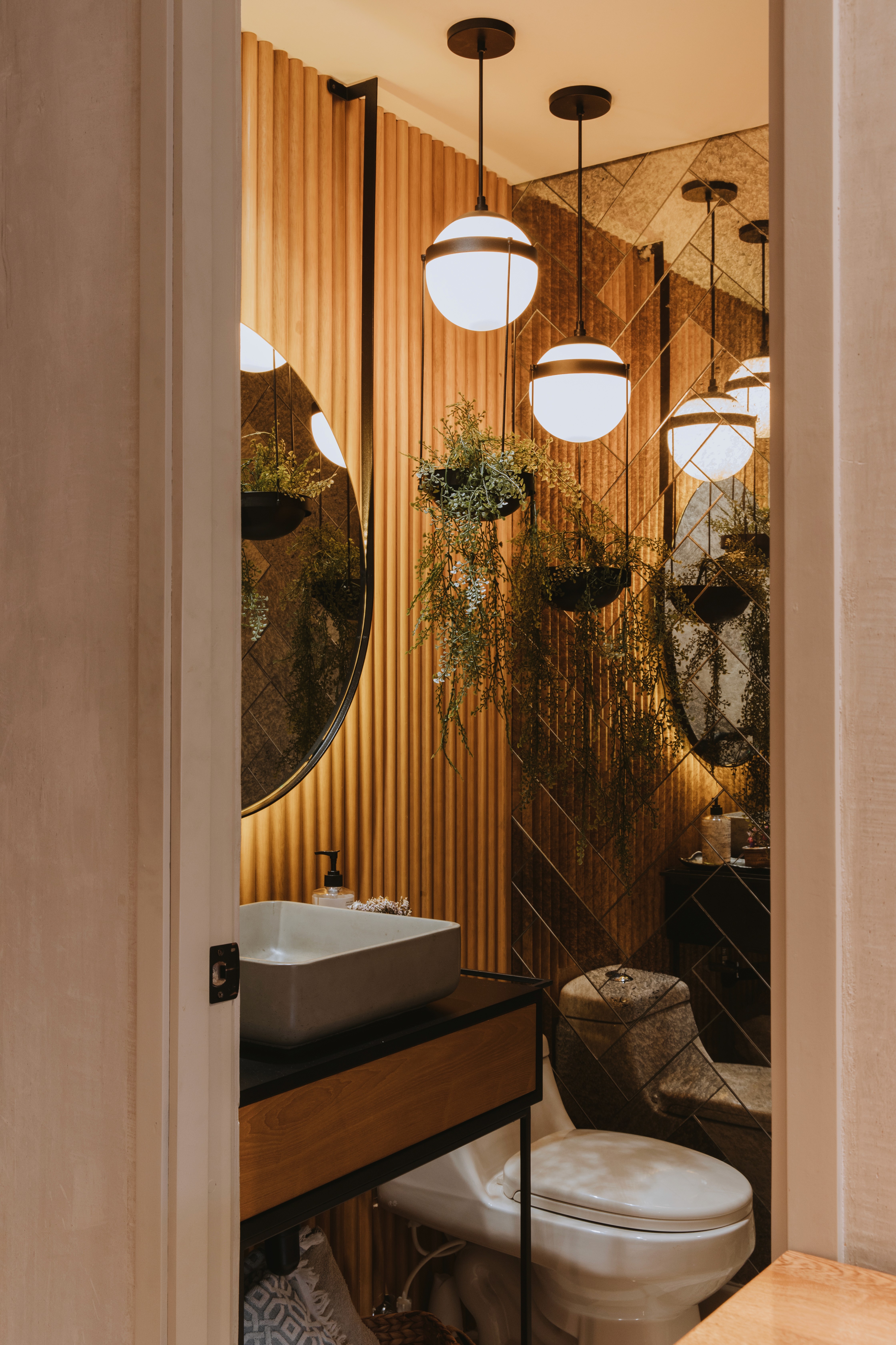 Double-height interior with flowing sculptural forms and warm raking light
