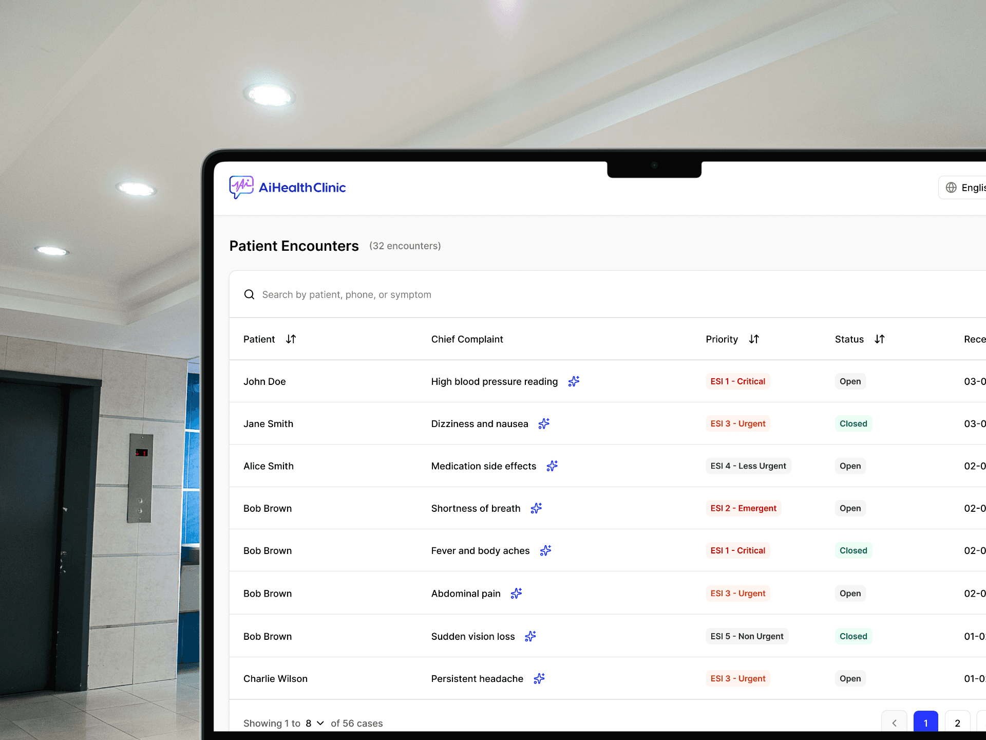 Screenshot of the AI Health Clinic patient queue dashboard showing prioritized cases with complaint types and urgency levels, displayed on a monitor in a clinical setting.