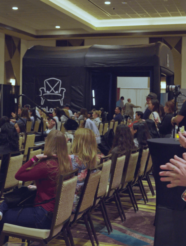 inflatable enclosure with seating and television