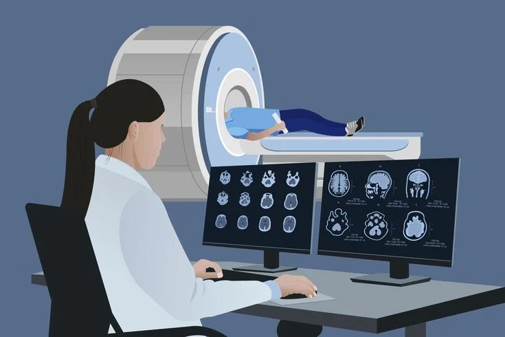  A radiologist analyzes the results of a patient's brain MRI on a computer monitor.