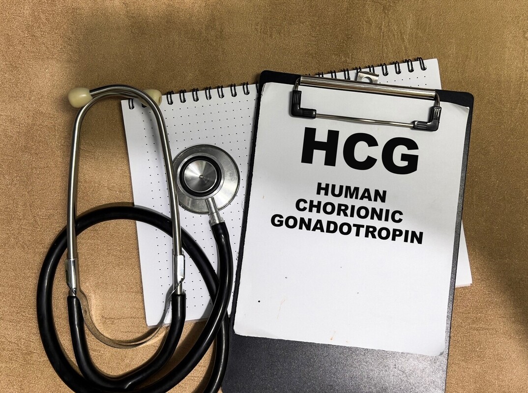 stethoscope and clipboard showing HCG concept to show whether it works as an option for weight loss injection drugs