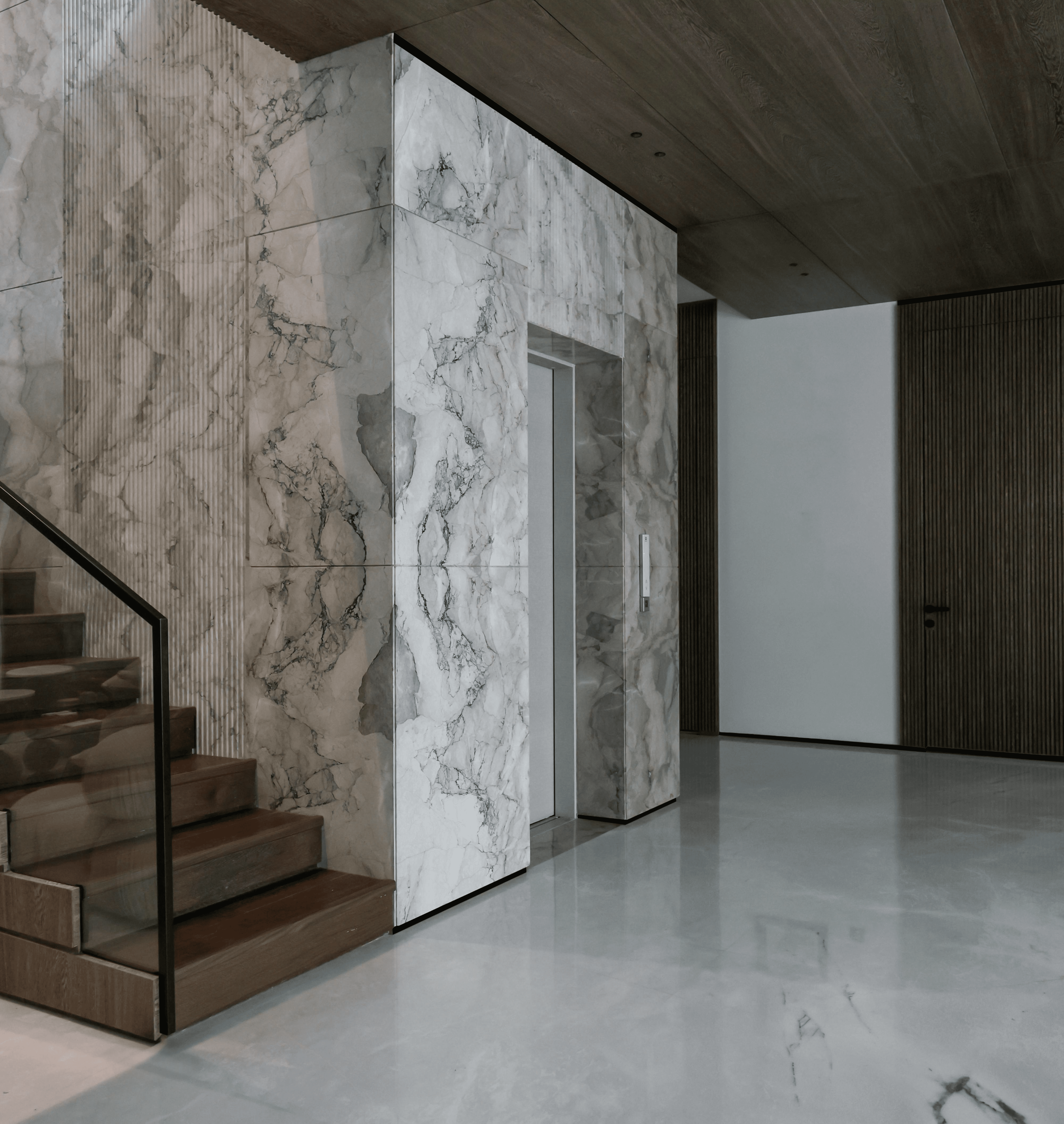 Organic architectural forms with warm wood tones and flowing ceiling structure