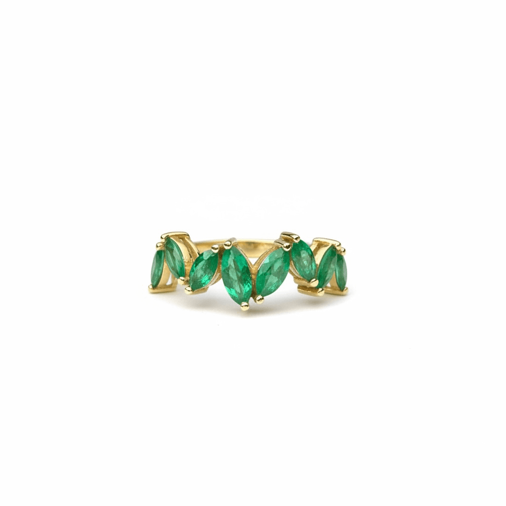 Anillo de oro con esmeraldas marquise