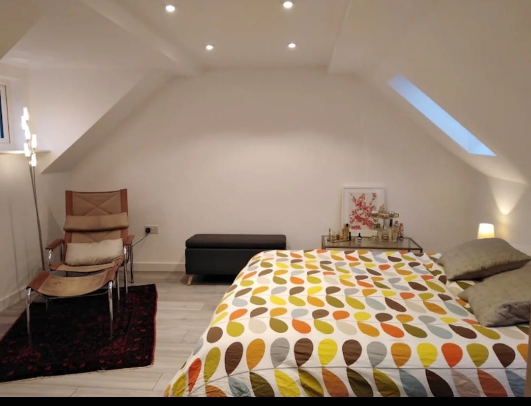 black flat screen tv on brown wooden tv rack