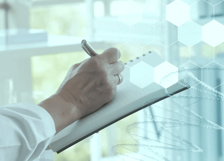 Two individuals engage in a discussion at a whiteboard, with one drawing diagrams and writing notes, conveying a collaborative business meeting environment.