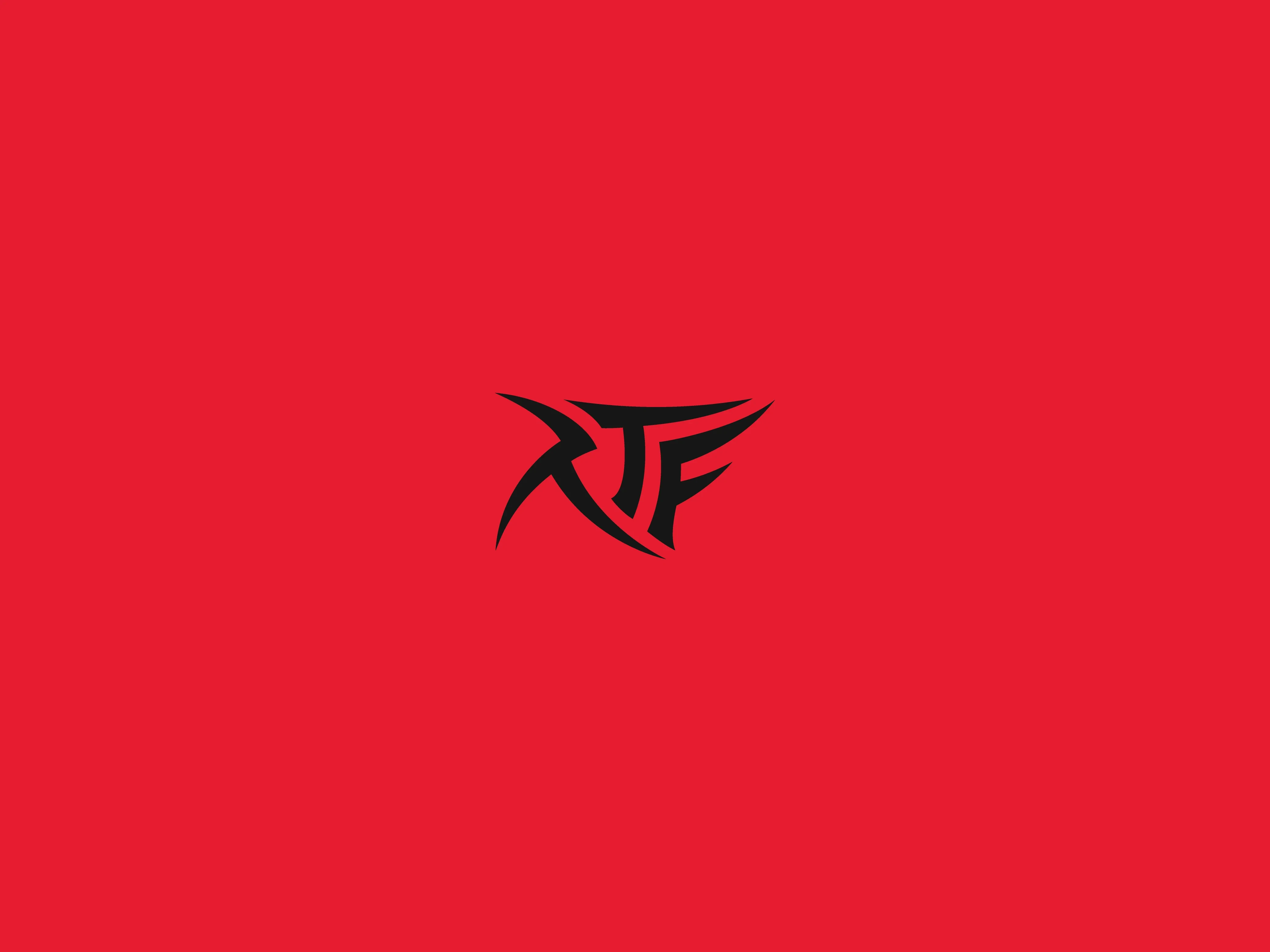 RTF red logo on a black and white image of a helmet rests on a motorcycle