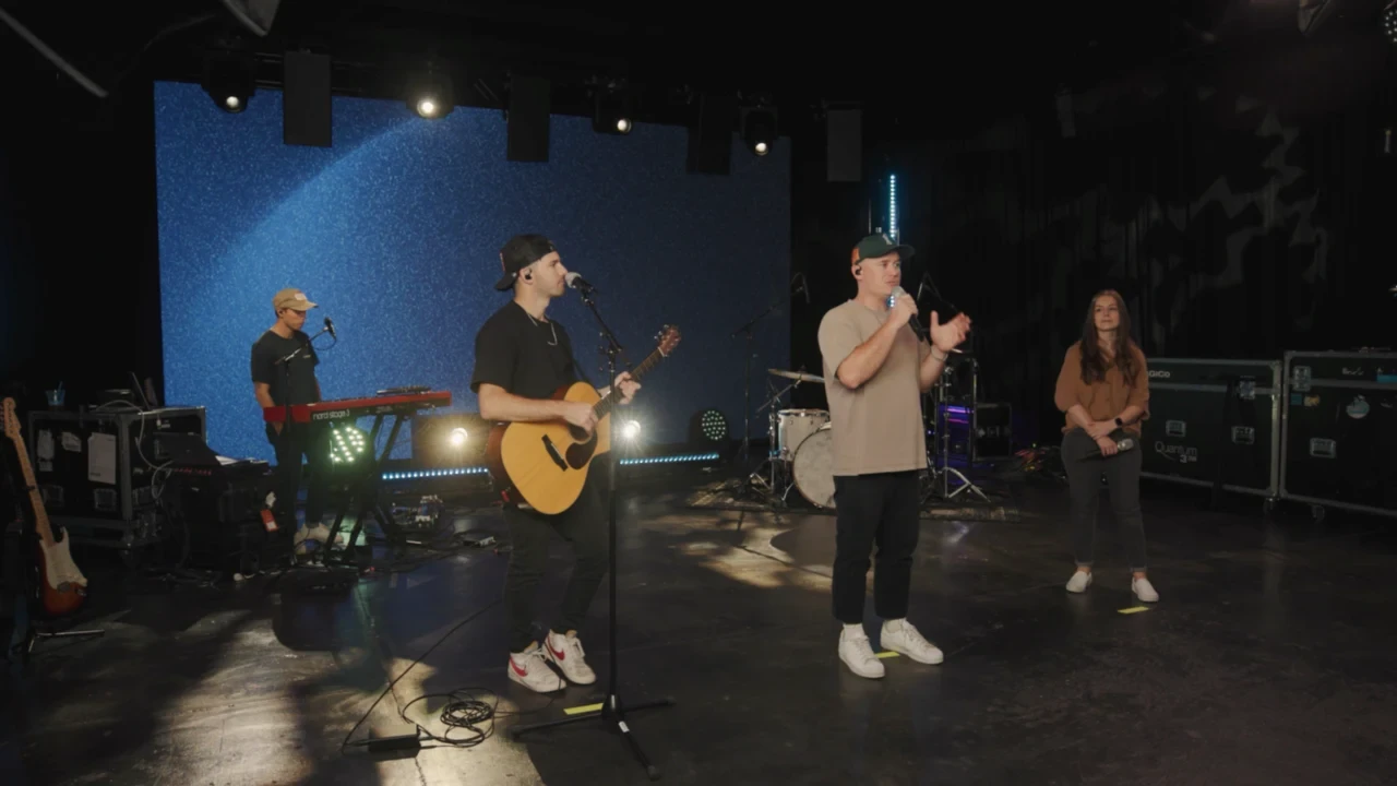 A real MxU worship training session with an instructor and worship team