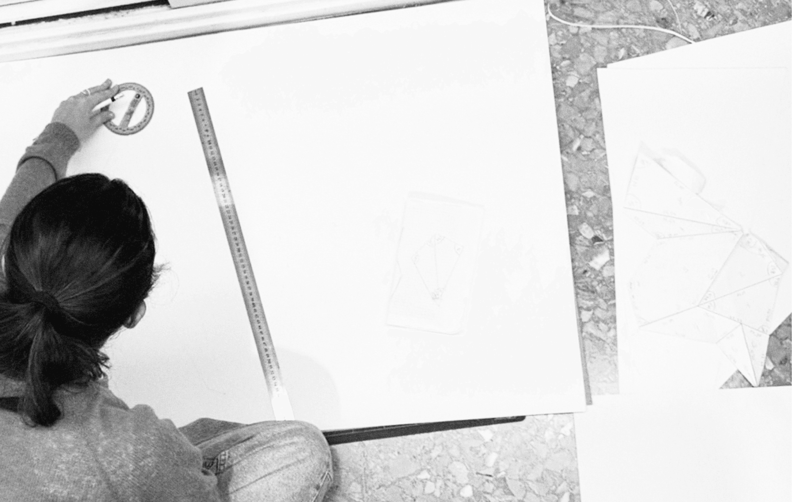 a blurry photo of a woman in a white shirt