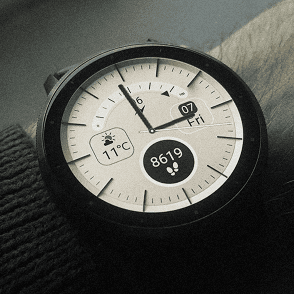 Garmin venu watch displaying an analog watch face