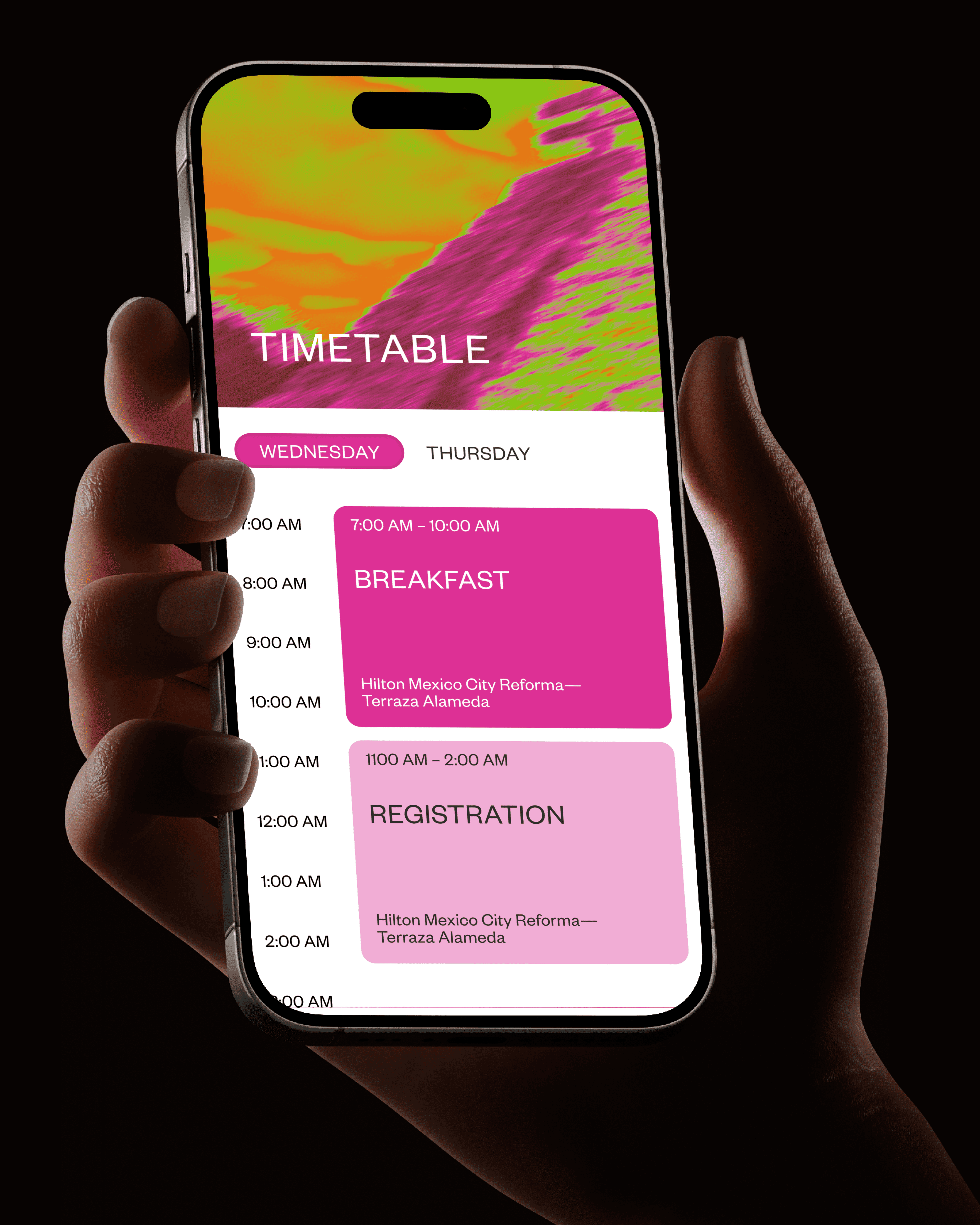 iPhone showing the IDC 2026 timetable screen with Wednesday and Thursday schedule tabs and magenta session highlights