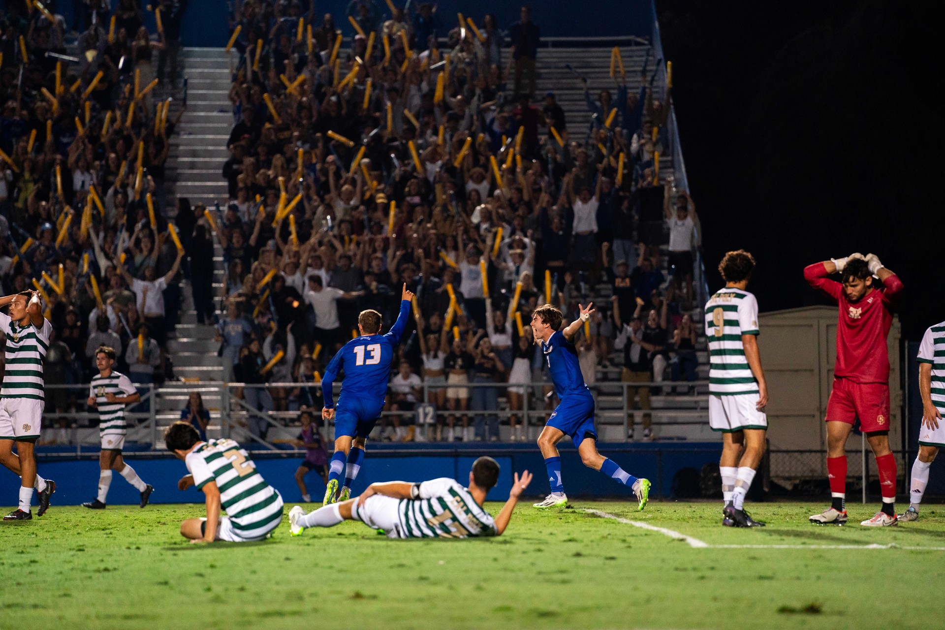 Drone shot of a running track at night