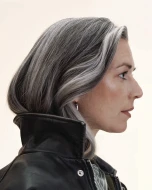 A model with dimensional grey hair.