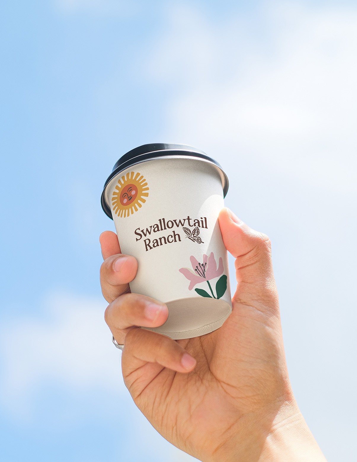 takeaway cup with illustrations and logo