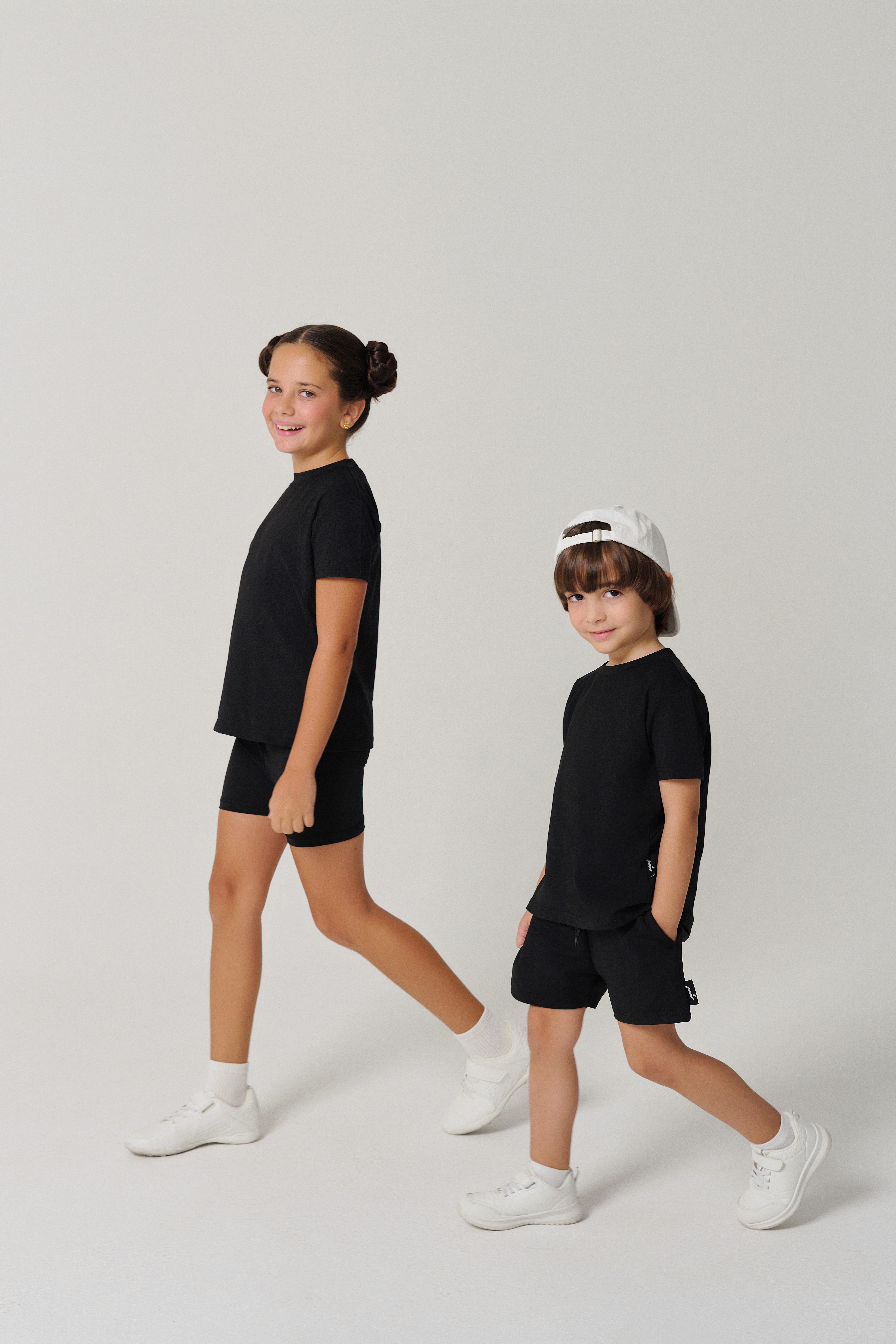 Friends laughing and posing inside a car