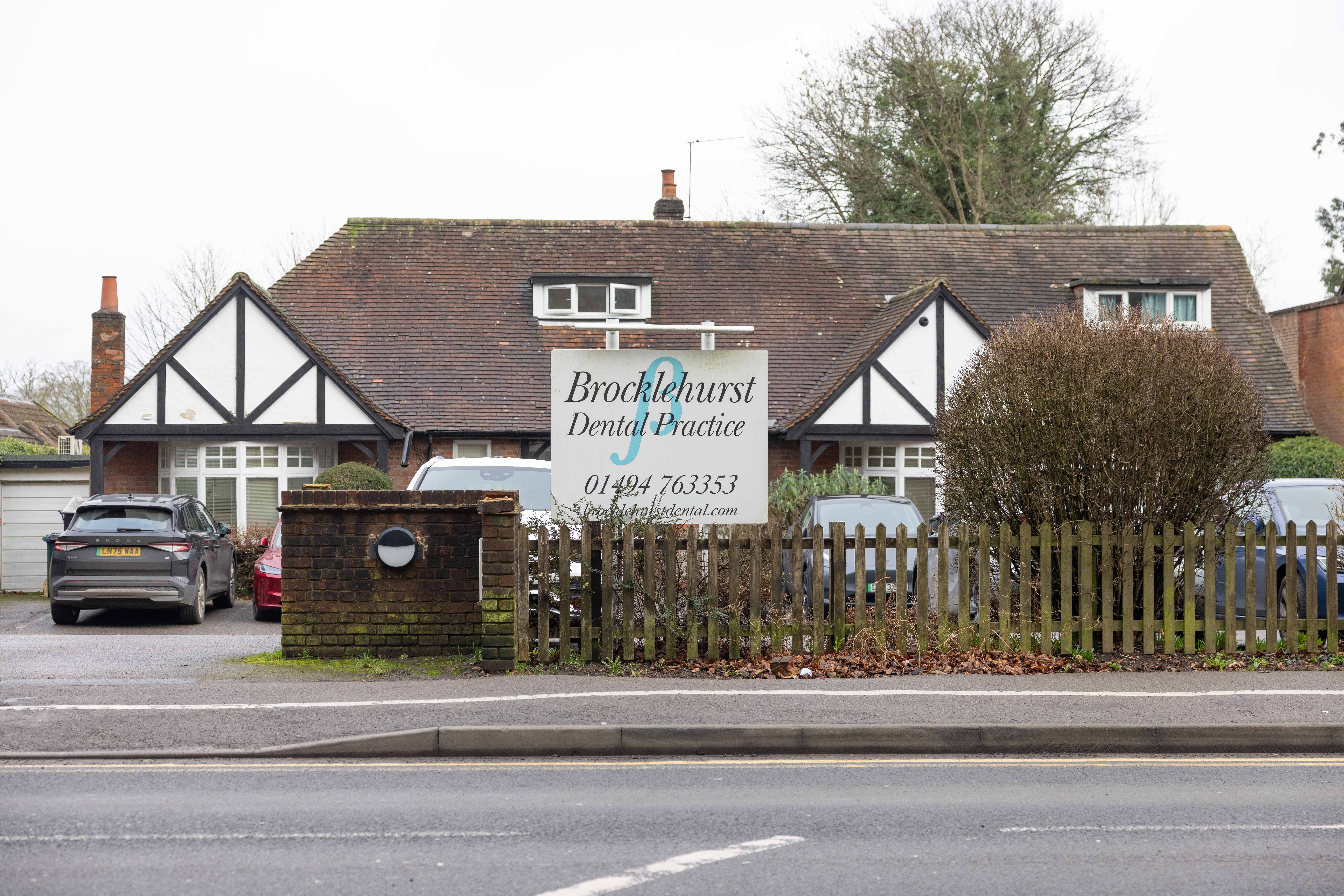 gray and black glass building under blue sky during daytime