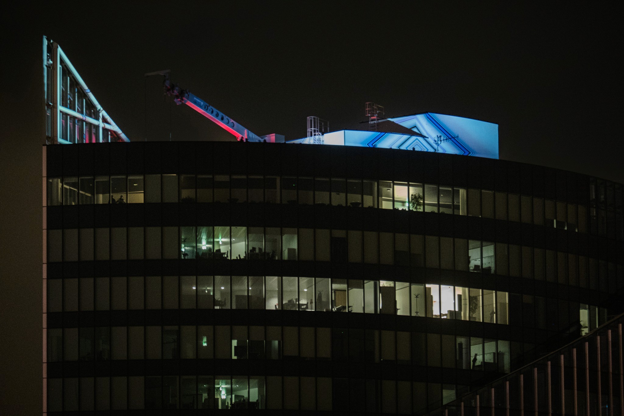 Night close up shot of an event happening on a roof in Brussels