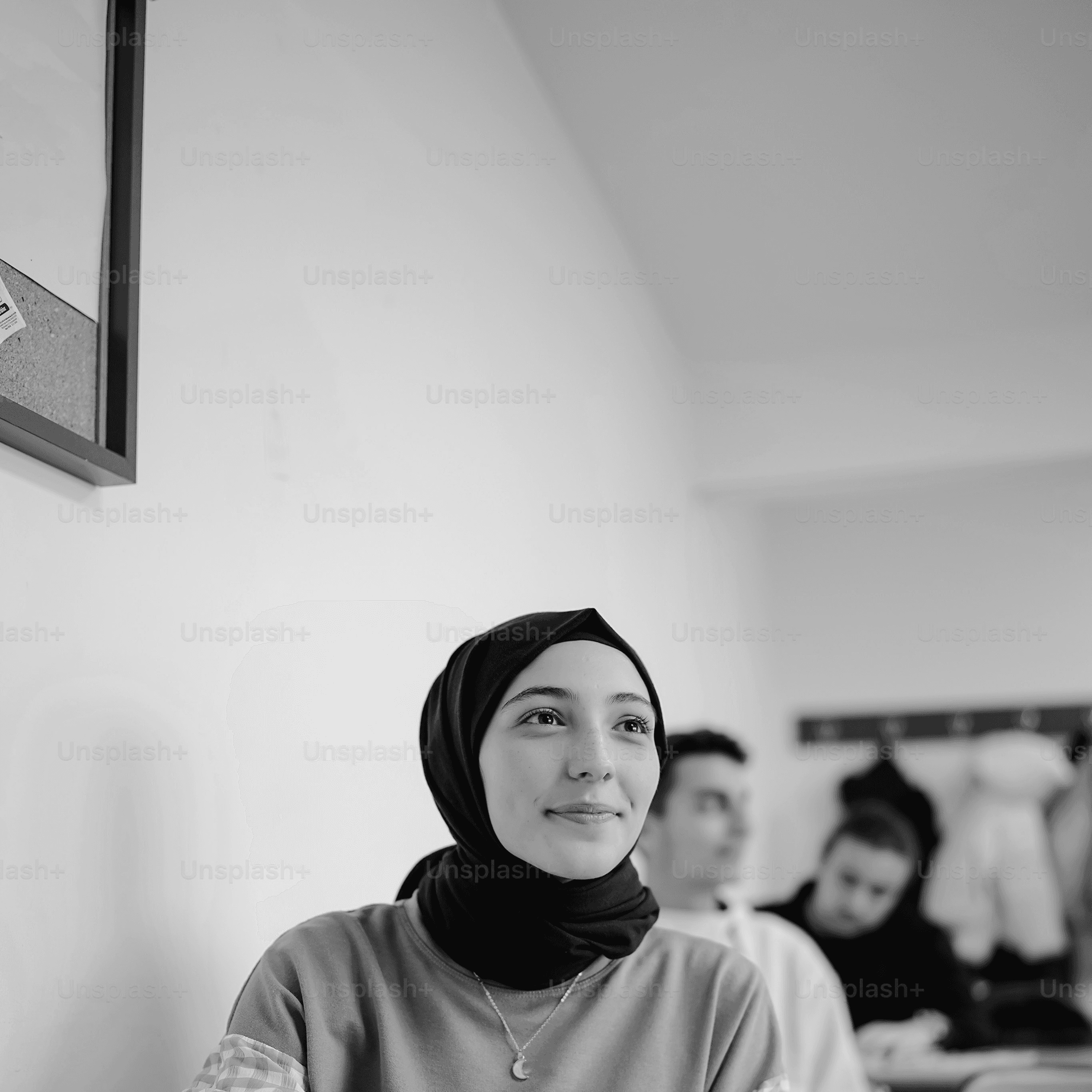 a person with the hands on the chin