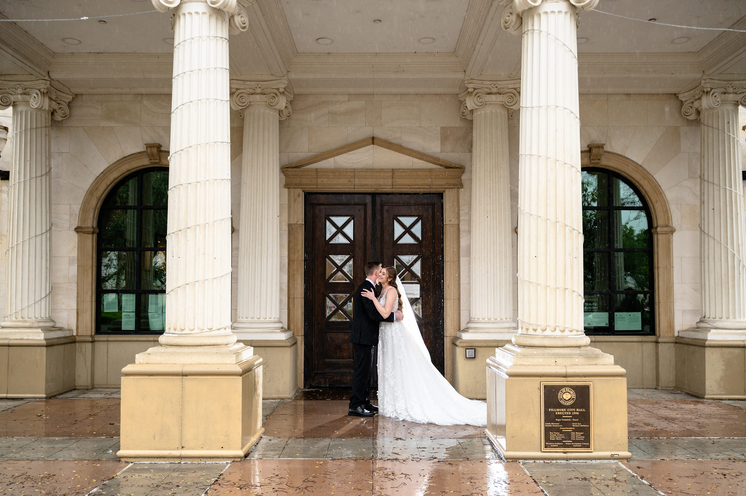 Flat lay wedding details with bouquet, rings, and sparkling bridal heels
