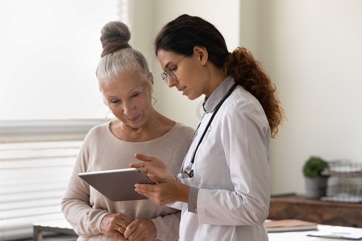 doctor explaining to a lady 