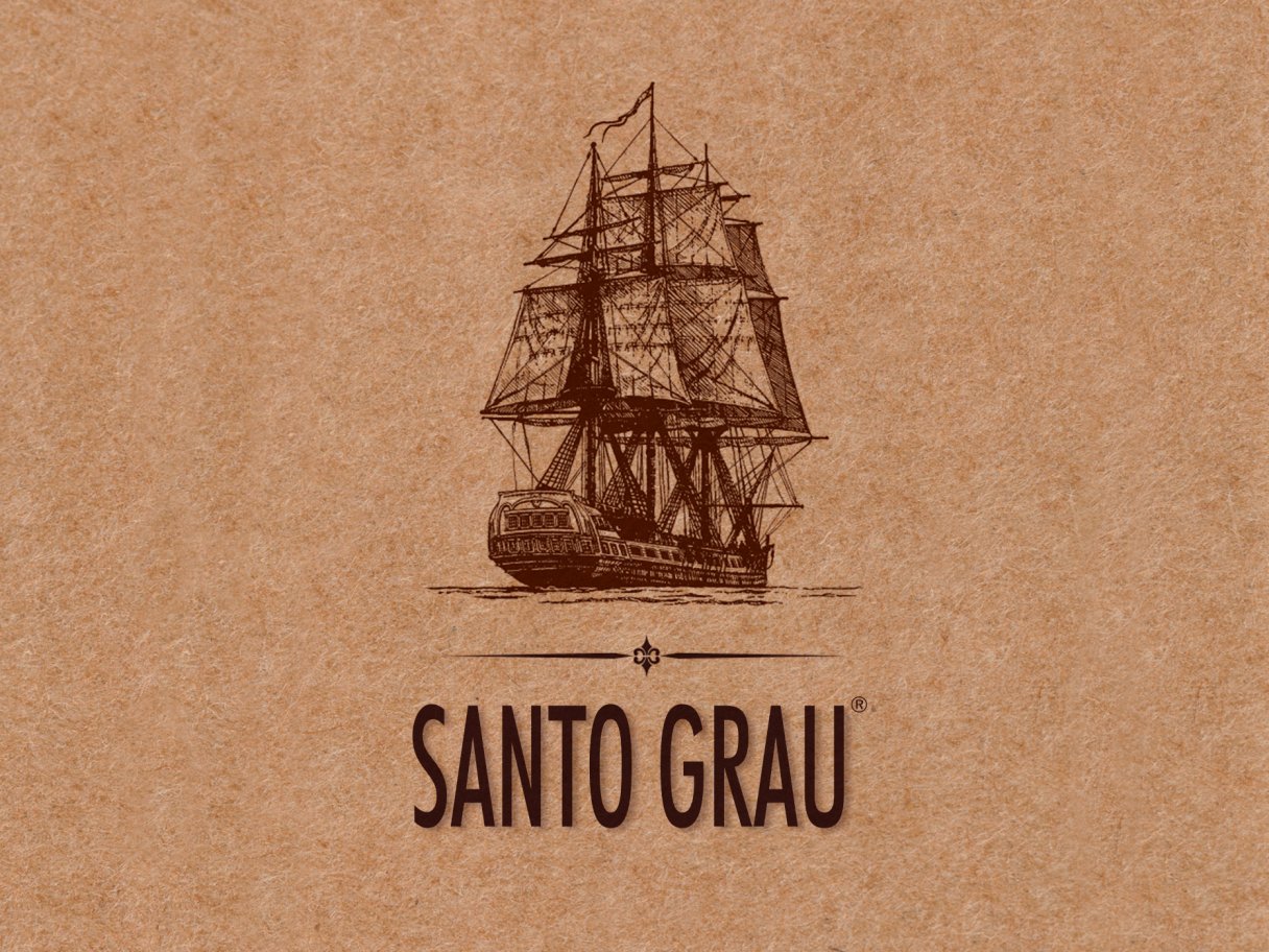 Rustic cabin in a golden field at sunset