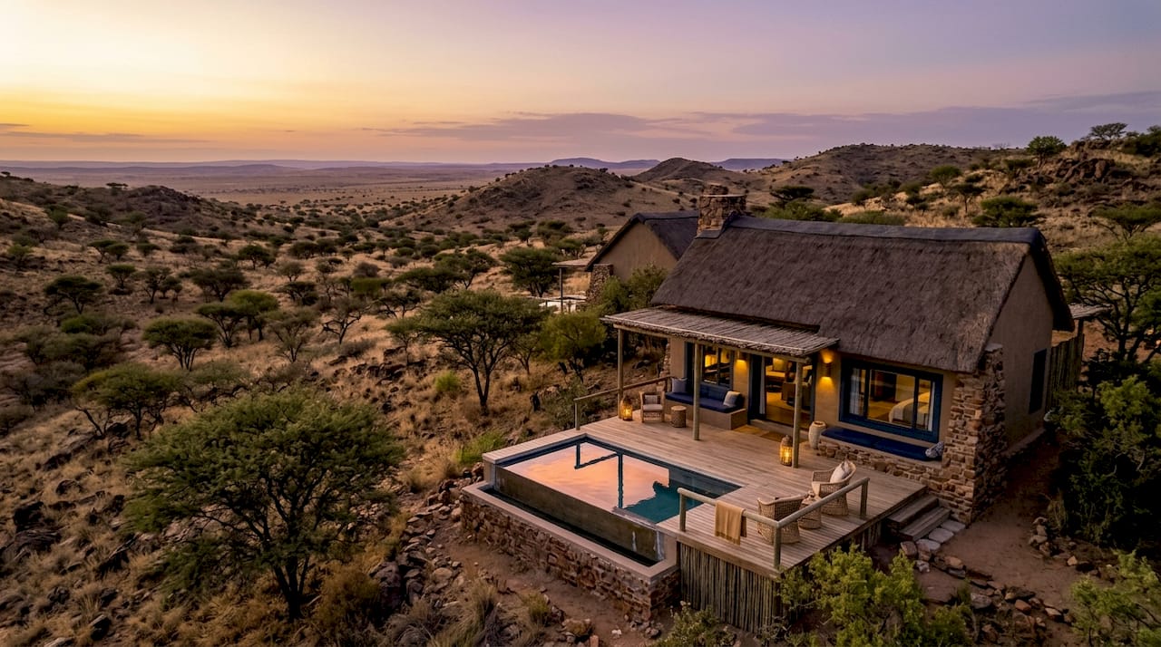 Luxury desert lodges at sunset in Namibia