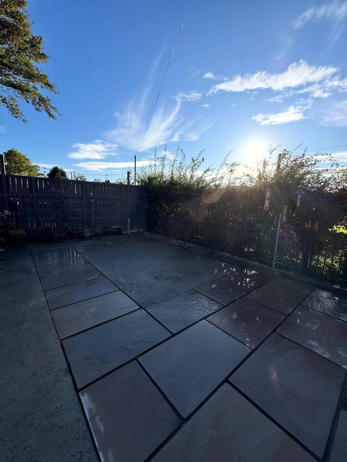 Newly laid Indian stone patio in a Todmorden garden