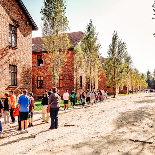A group visiting Auschwitz on a guided tour