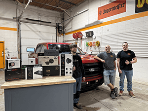A person stands in a sandstone cave.
