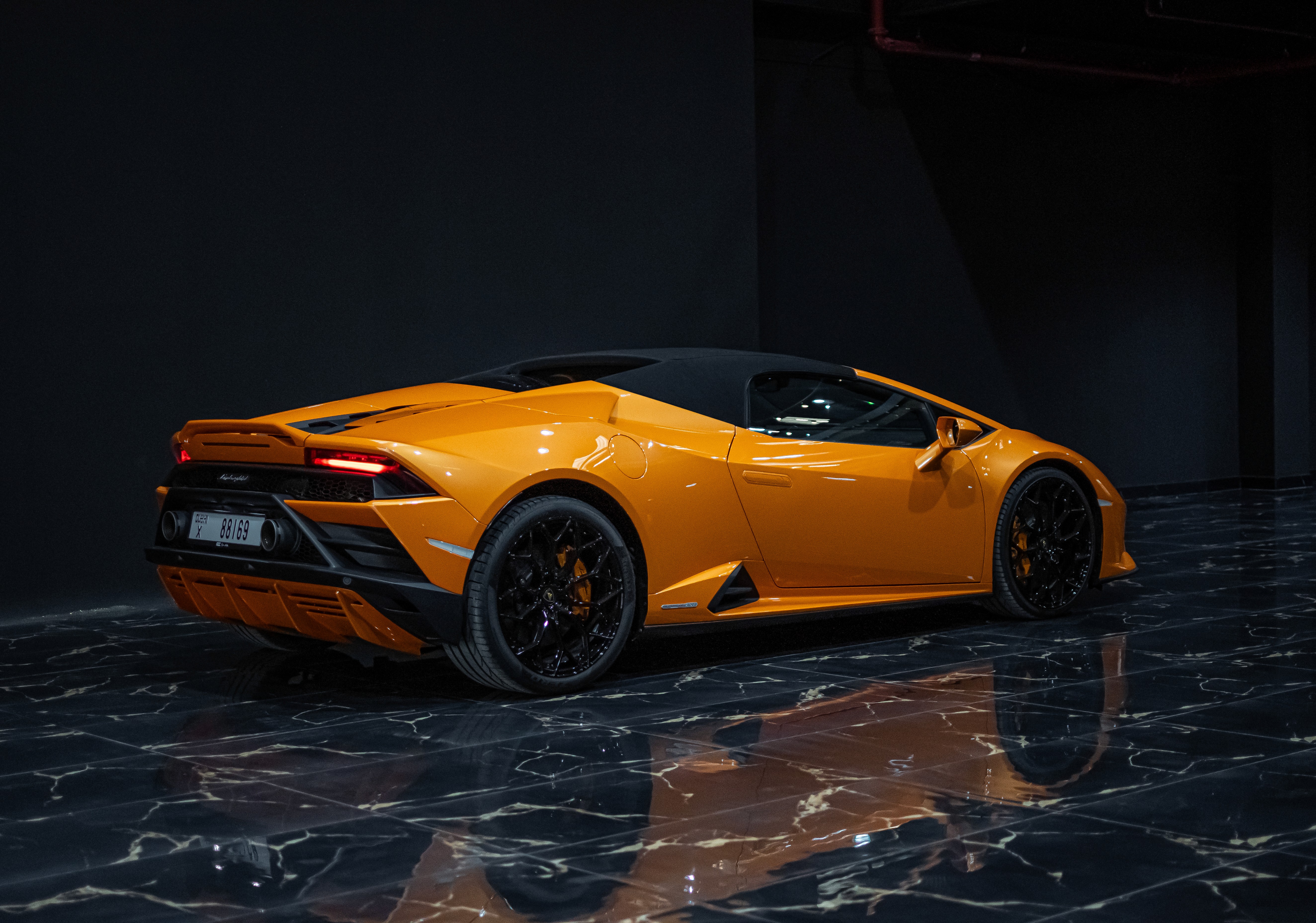 Rear view of Lamborghini Huracan EVO Spyder AWD luxury supercar rental in Dubai