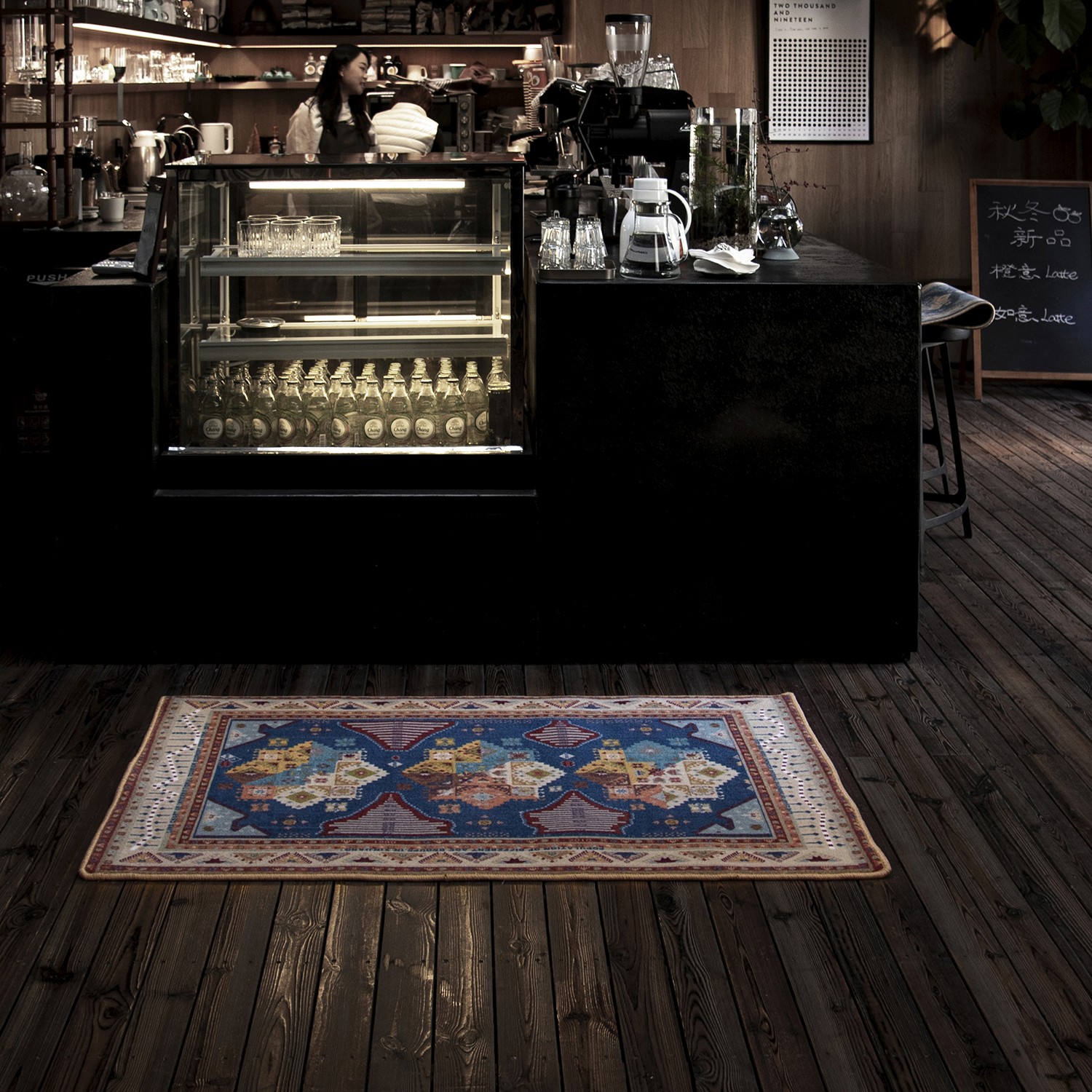 carpet designed by Miao Zhao in use in a cafe