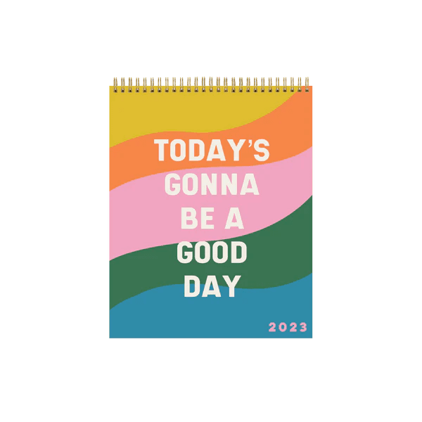 Calendar with rainbow stripes and it reads "today's gonna be a good day"