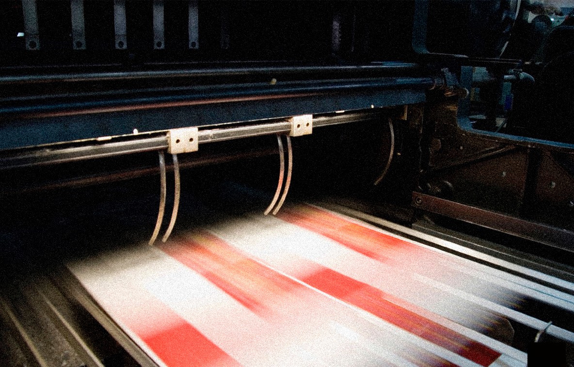 Two Men Using Laptop