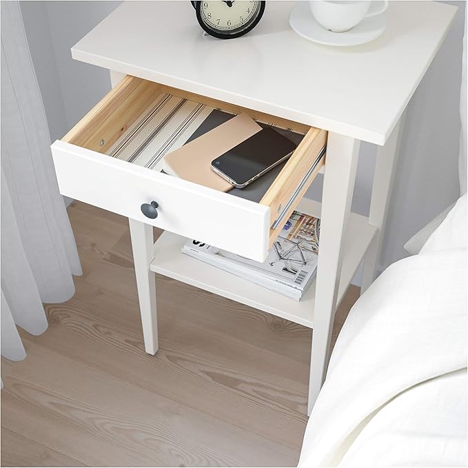 Elegant hemnes nightstand with ample storage space and a timeless design.