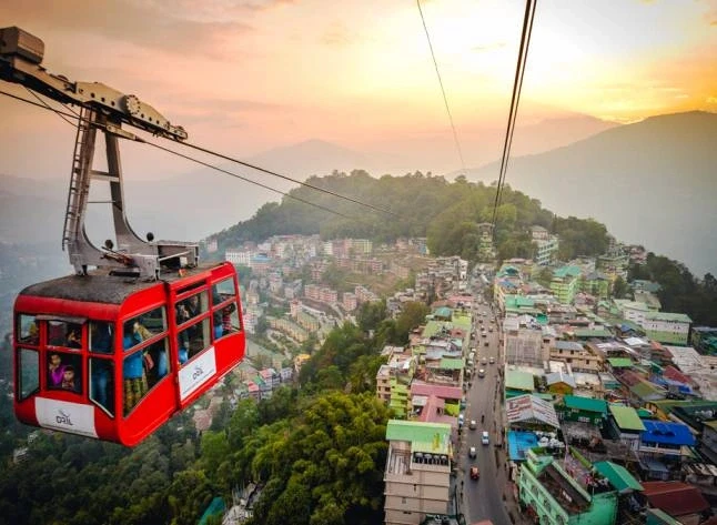 Red cable car over city