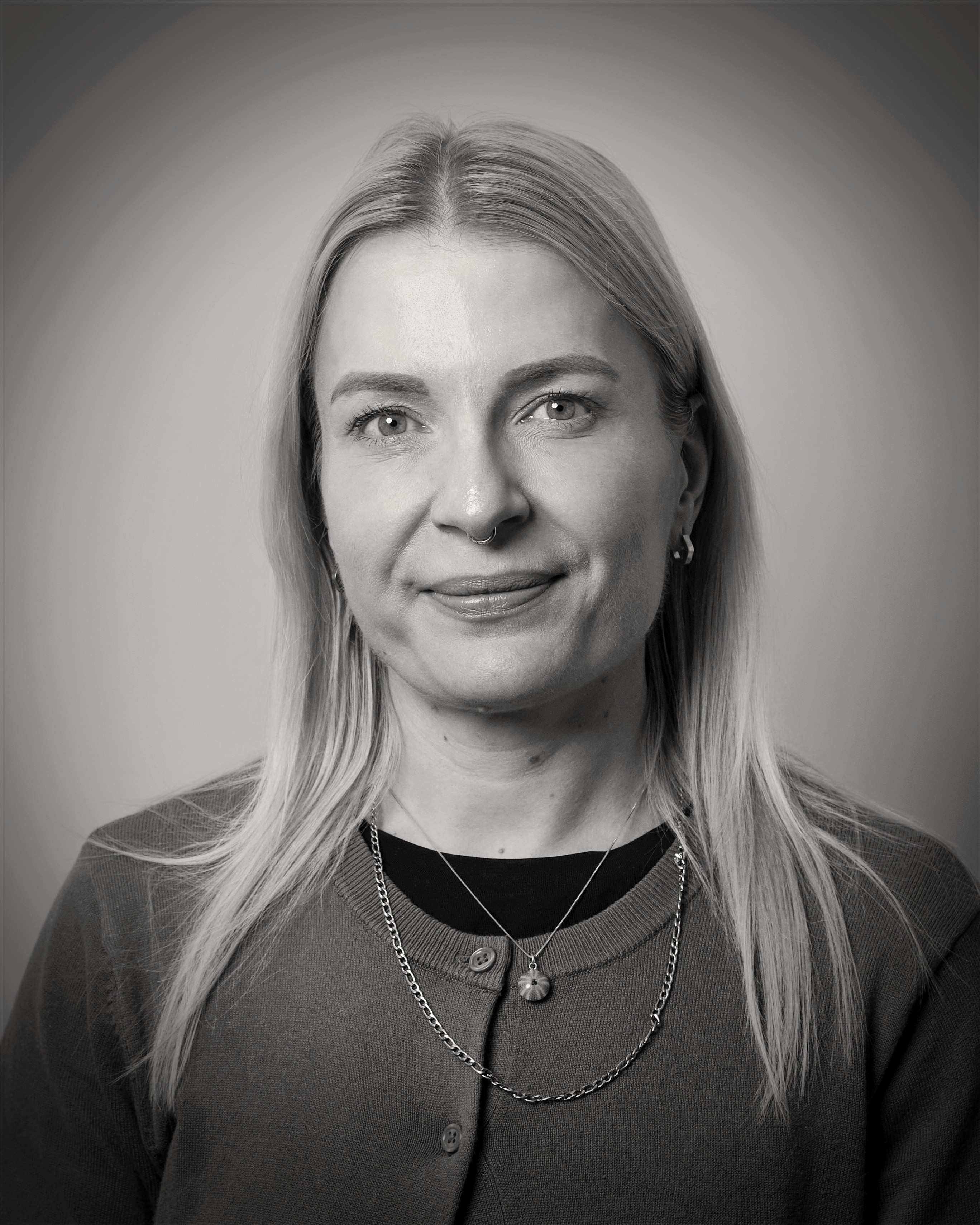 headshot of female in bright background
