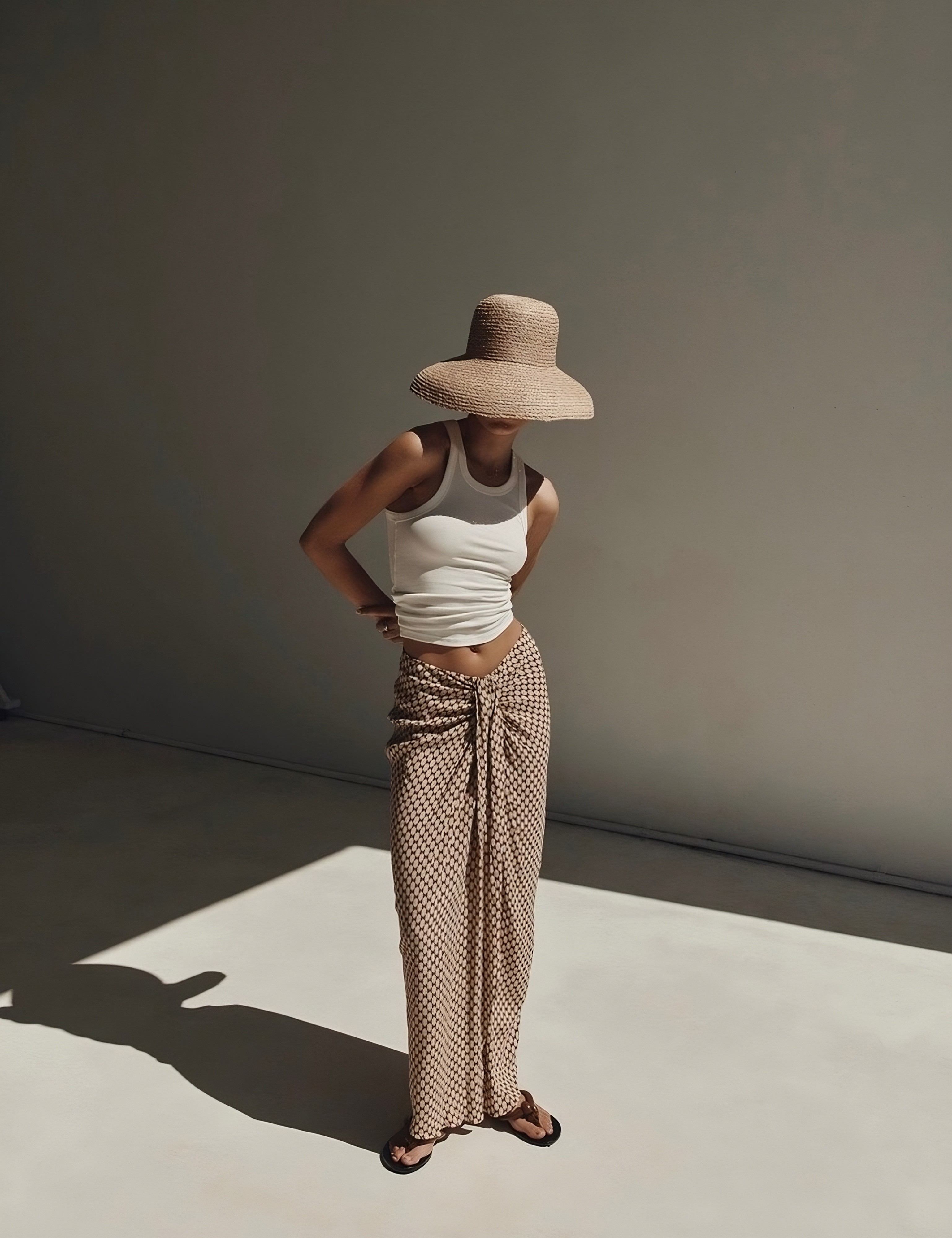 Fashion photoshoot with a woman posing in a dress