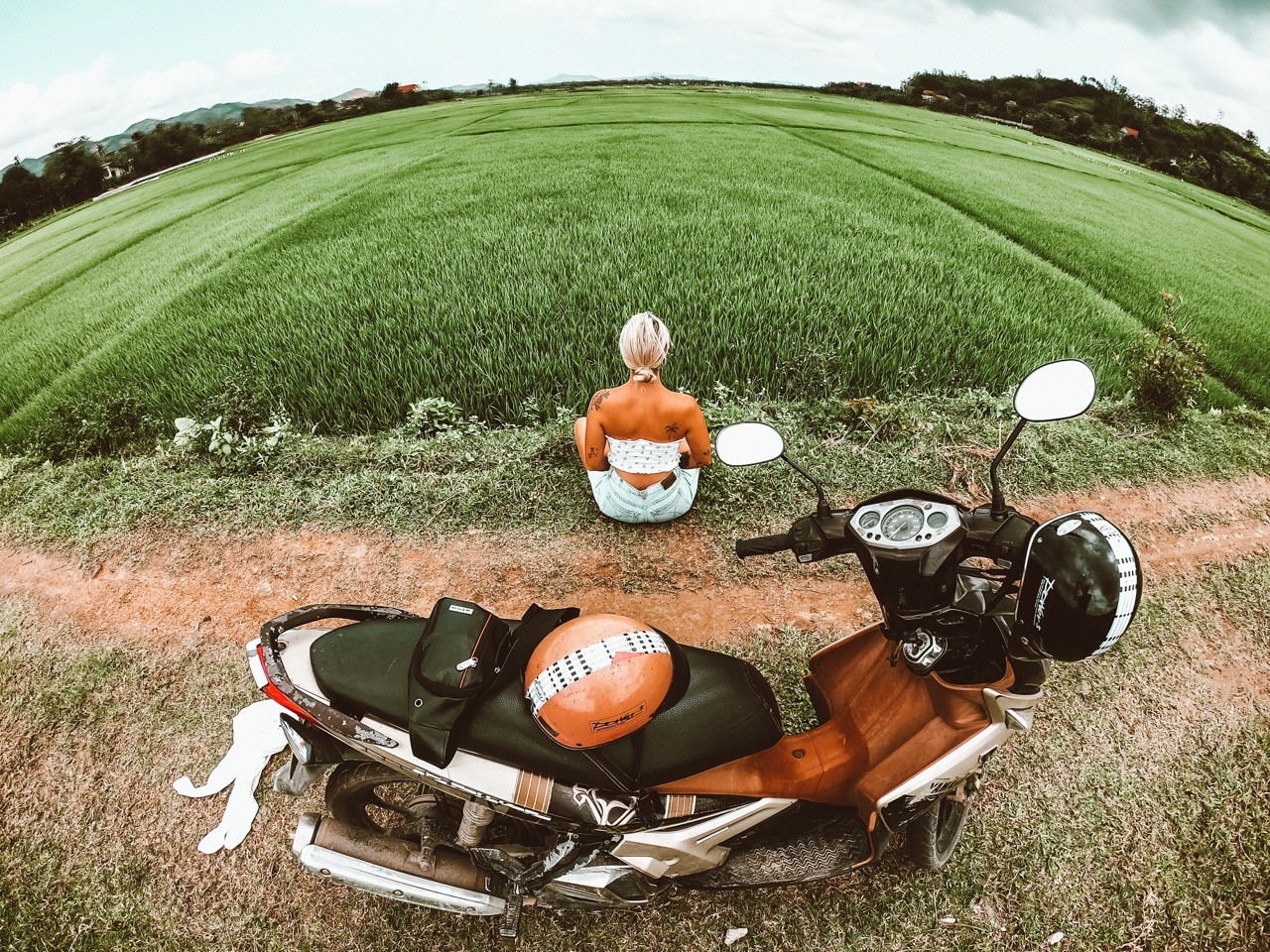 Girl next to bike