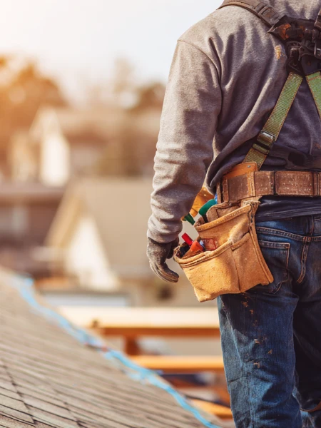 Roofer Standing on Roof