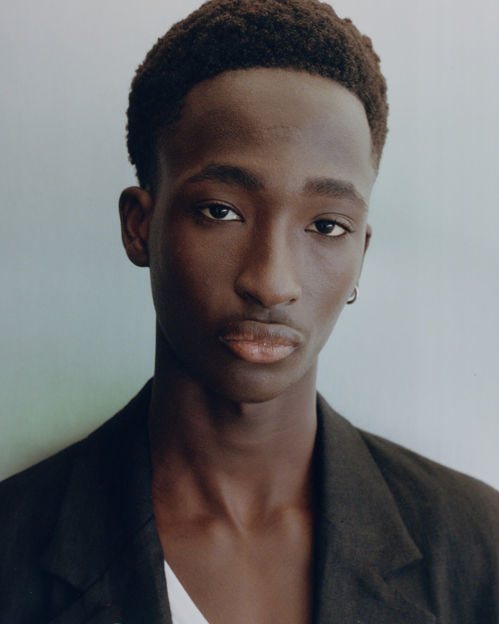 woman taking photo while showing smile