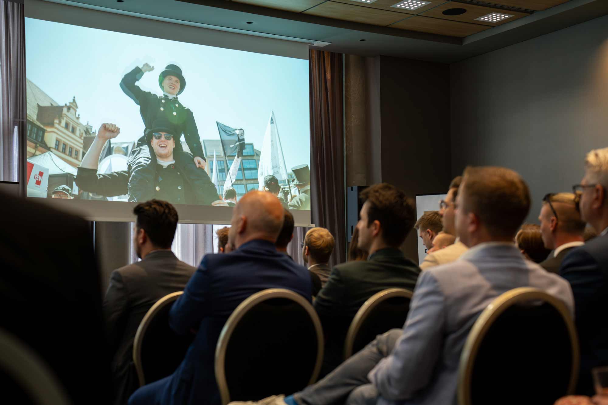 Audience engaged in a film production seminar, showcasing strategic film campaigns and storytelling for social media ads.