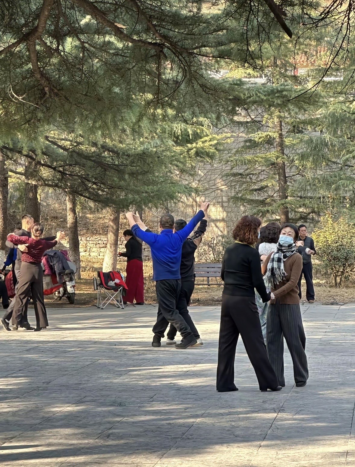 Local residents dancing in the square at Chengdu People's Park
