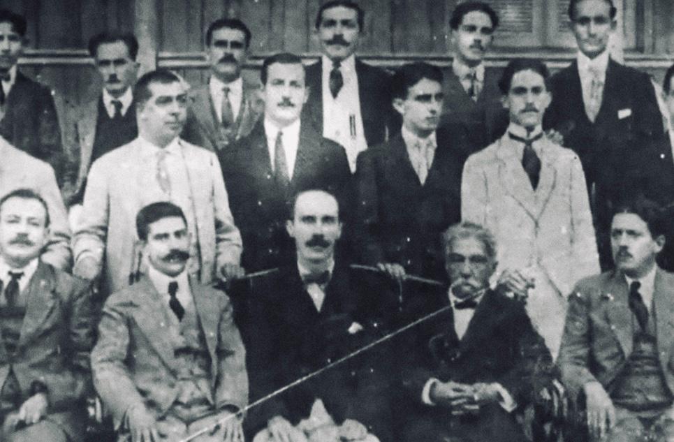 2 boys and girl playing soccer during daytime