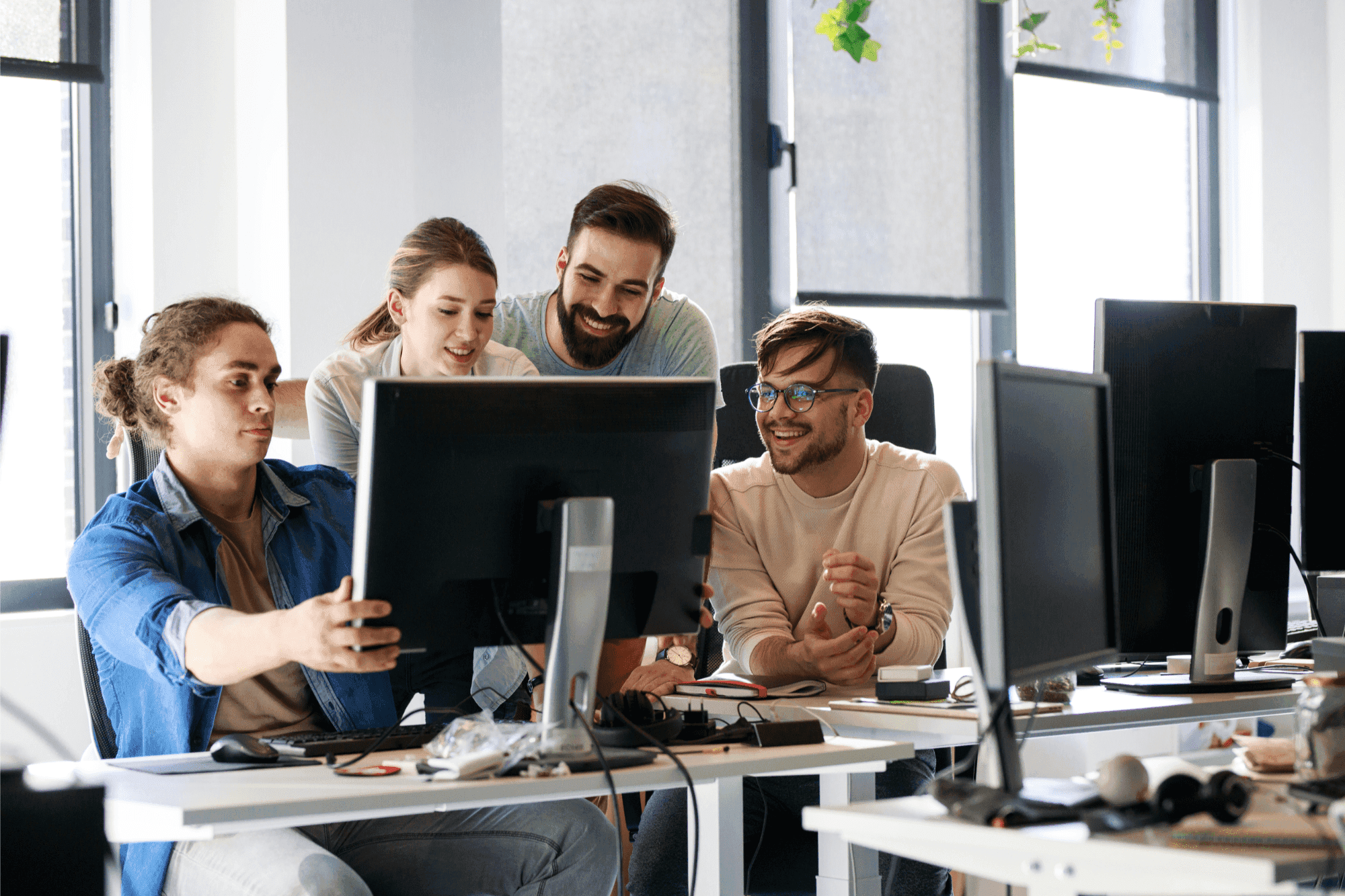 person with computer - Software Developer Contract Rates 