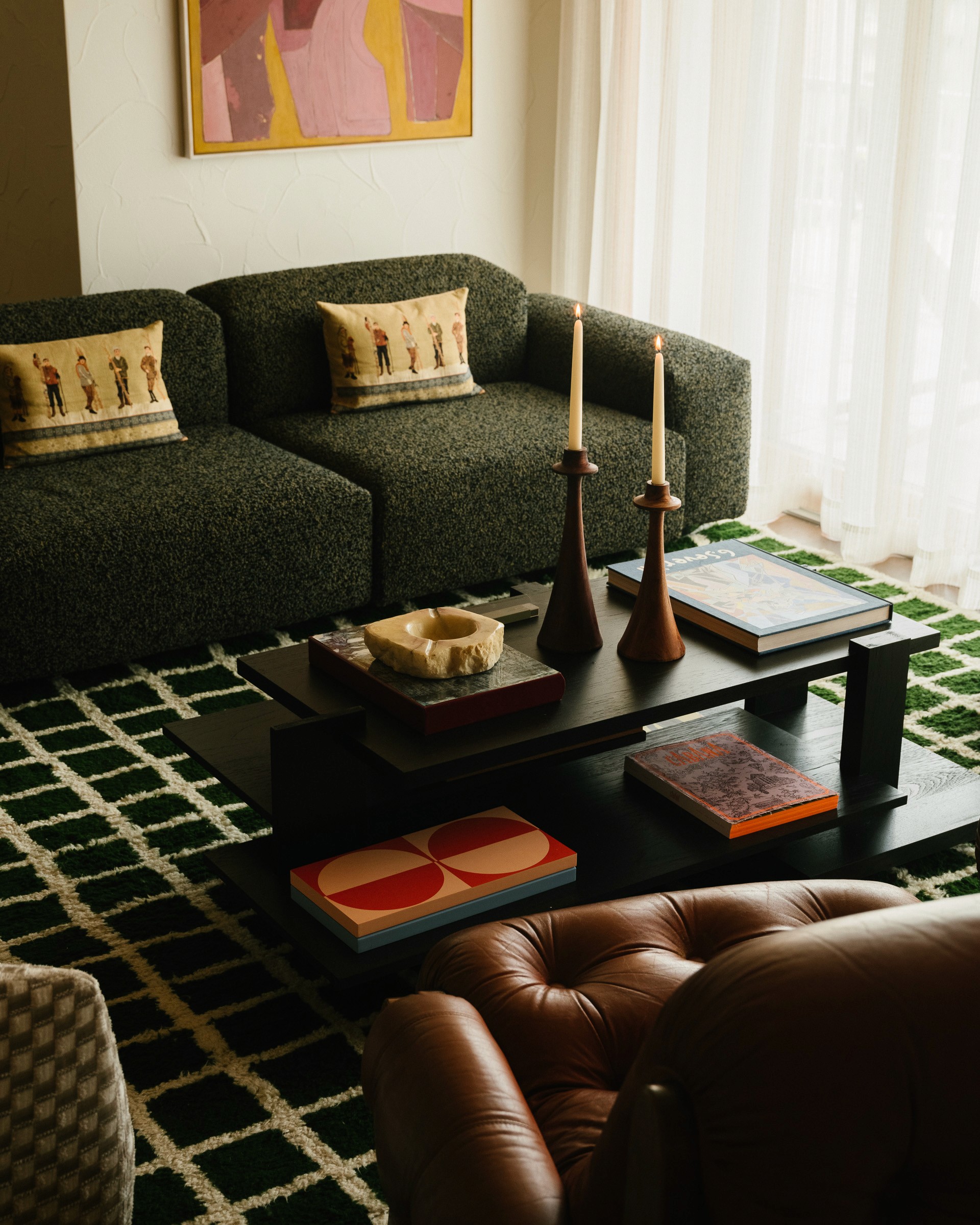 Streetside billboard with flyposters of the Batch.Works brand and illustrations