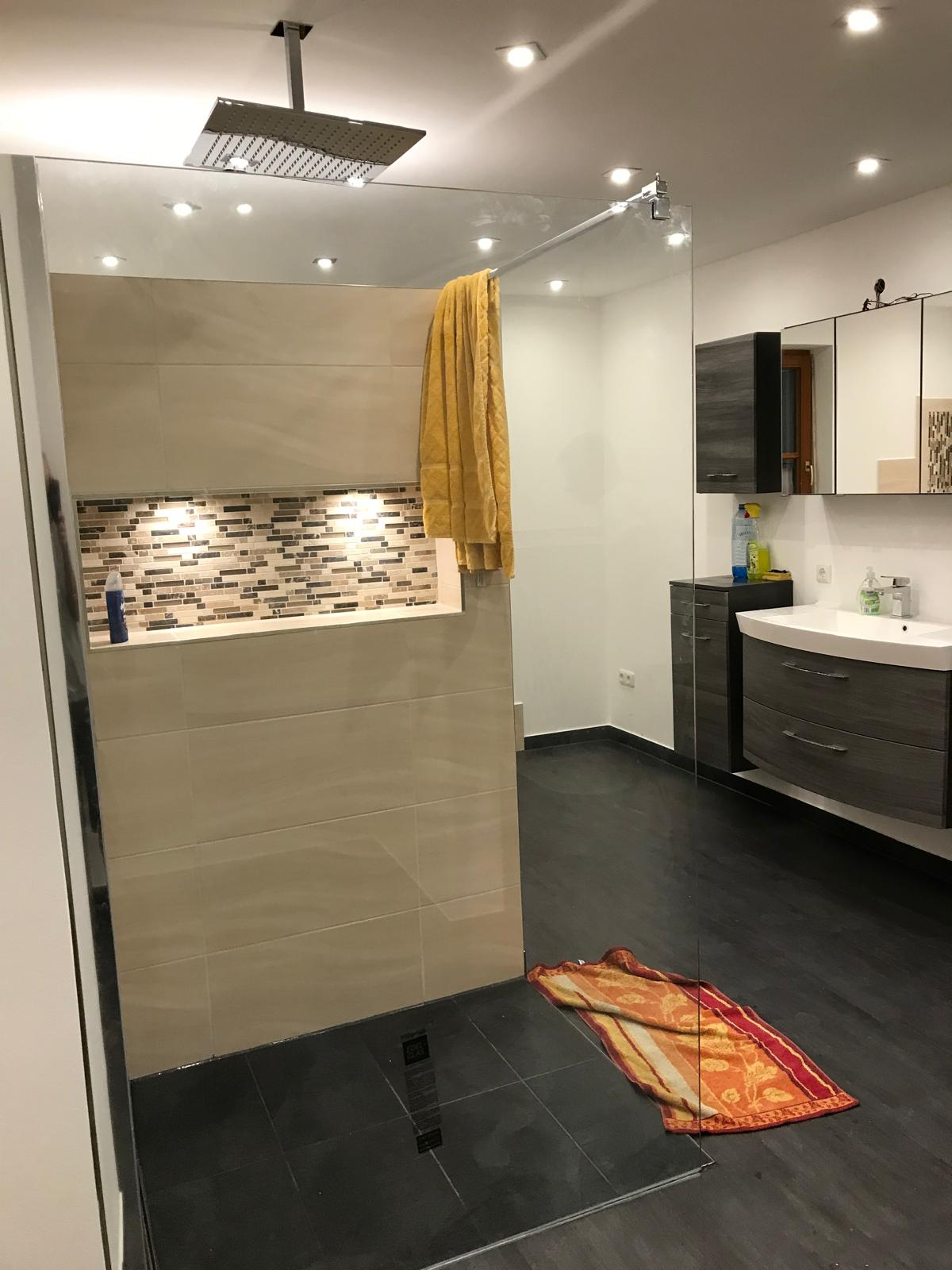 man sitting beside woman looking at a contract on DocuSign